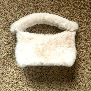 New W/O tags ANewDay faux fur small purse. Cream and tan. Zipper closure.